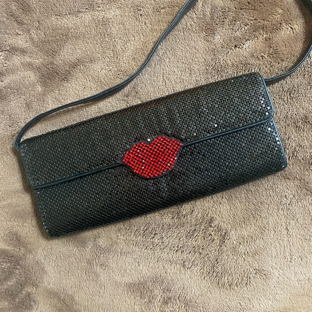 Cach’e Black and Red Lip Clutch